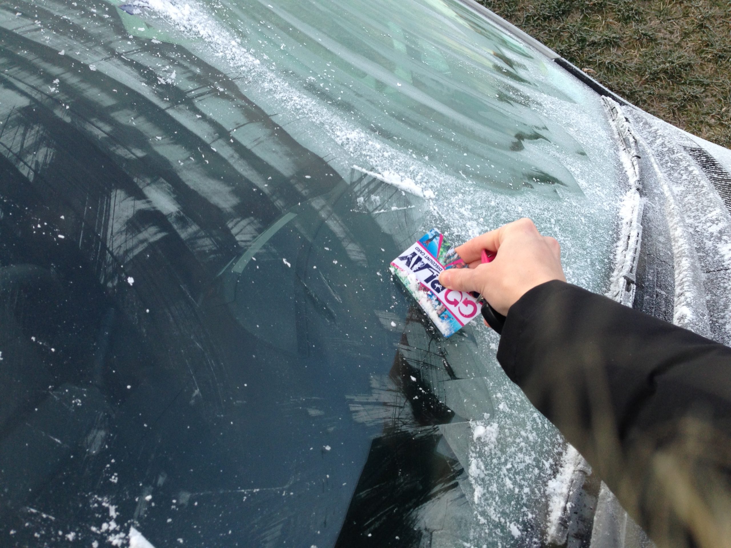 Credit Card to defrost windscreen in New Zealand winter Travel Tips Blog